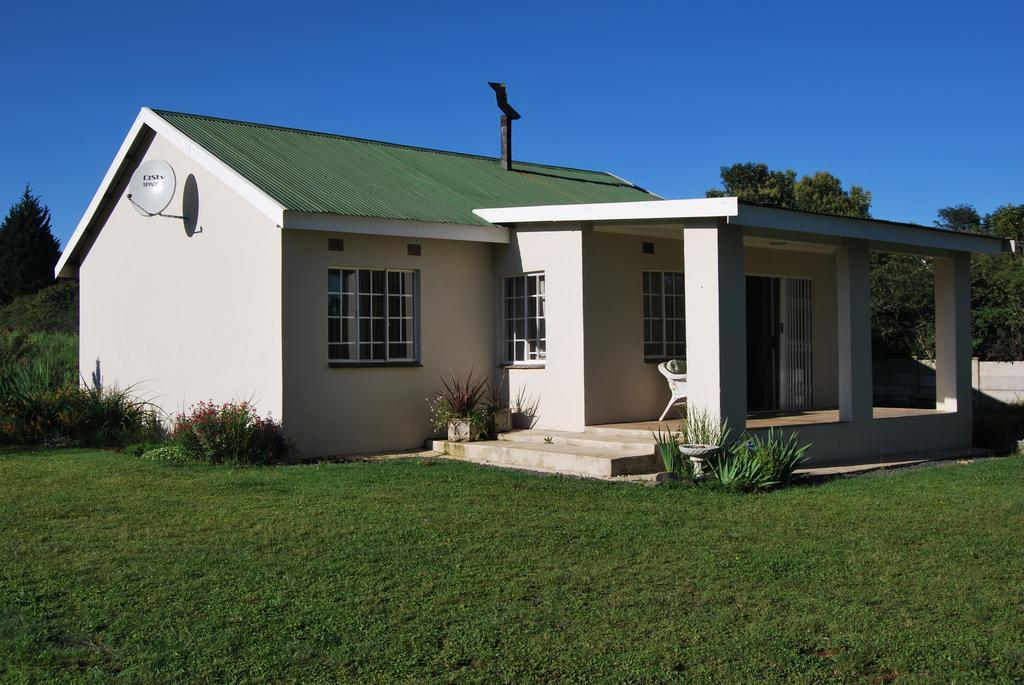 Moya Cottage Underberg Rum bild