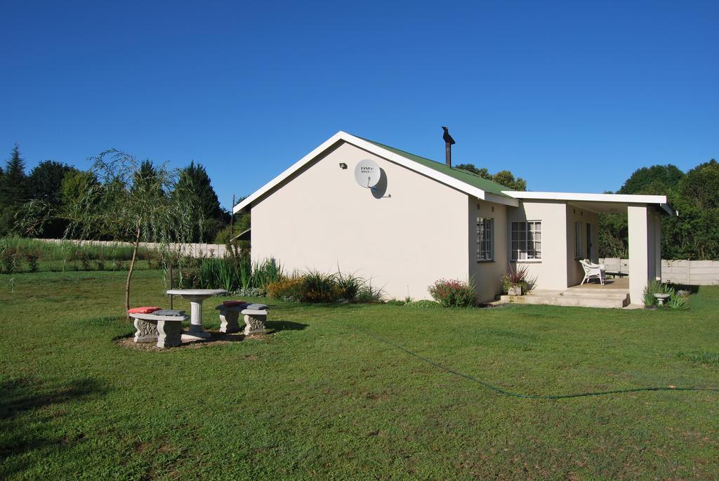 Moya Cottage Underberg Rum bild
